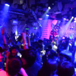 people dance at a nightclub