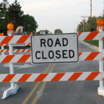 road closed signage in front of construction site