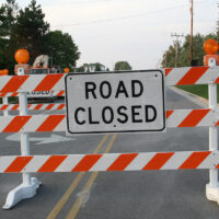 road closed signage in front of construction site