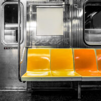 New York City subway car interior with colorful seats