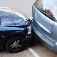 Car accident after car cuts off another