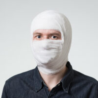 Guy with a bandaged face Guy with a bandaged face