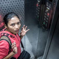 lady scared in an elevator