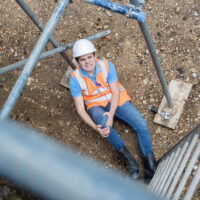 Construction Worker Falls Off Ladder and grabs their leg Construction Worker Falls Off Ladder and grabs their leg