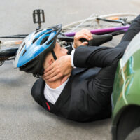 Male Cyclist After Car Accident