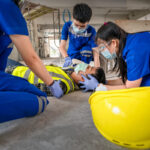 First aid for head injuries and Considered for all trauma incidents of worker in work. First aid training to transfer patient, loss of feeling or loss of normal movement.