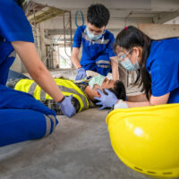 First aid for head injuries and Considered for all trauma incidents of worker in work. First aid training to transfer patient, loss of feeling or loss of normal movement.