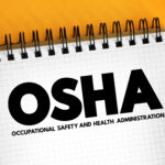 OSHA - Occupational Safety and Health Administration acronym, text concept on notepad