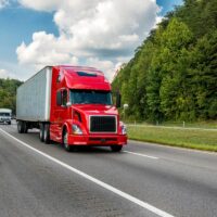 Red Semi Truck On An Interstate Highway