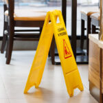 wet floor sign on the ceramic floor wet floor sign on the ceramic floor