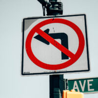 The no left turn sign on the side of the street in Manhattan - New York City. The no left turn sign on the side of the street in Manhattan - New York City.