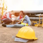 Men, construction, architect have accident during construction on site. Construction builder worker accident at construction site. Industrial accident. Health safe of work and safety first concept