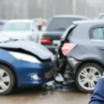 Car accident involving multiple vehicles with insurance agent assessing the situation
