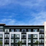 Modern apartment buildings on a sunny day with a blue sky